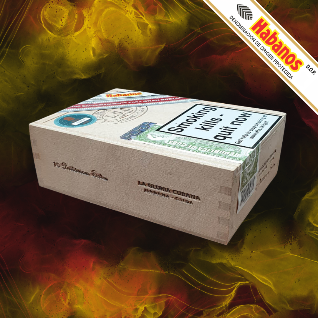 A wooden La Gloria Cubana Britannica Extra UK Regional Edition 2017 cigar box labelled Habanos La Gloria Cured, shown at an angle against a vibrant, abstract background of yellow, red, and orange smoke-like patterns.