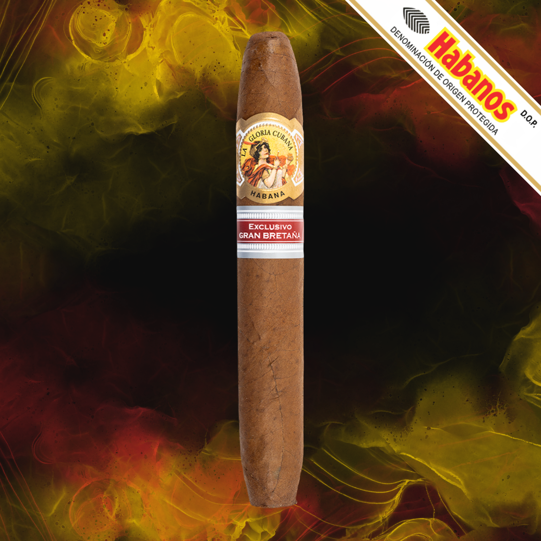A single La Gloria Cubana Britannica Extra UK Regional Edition 2017 cigar centred vertically against a dramatic dark background with yellow, orange, and red smoke-like patterns. 